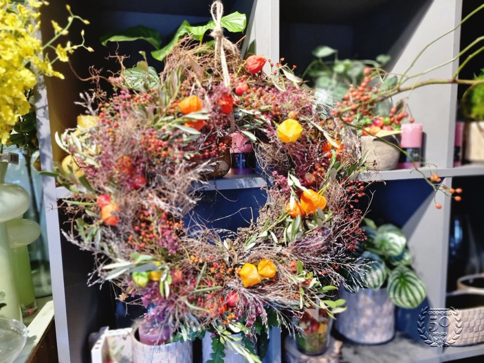 Bloemsierkunst Groeneveld deurkrans voor elk seizoen